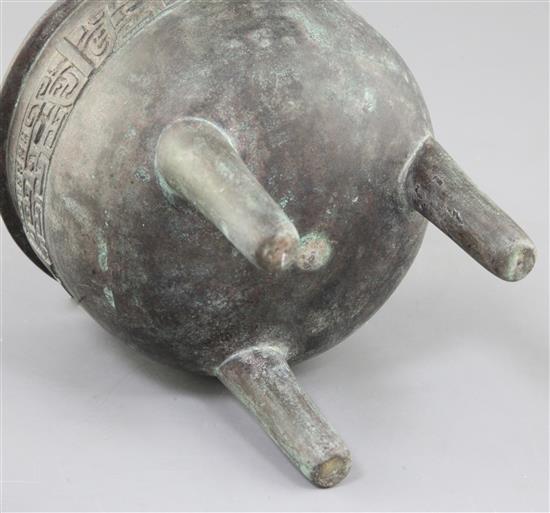 A Chinese archaic bronze tripod ritual food vessel, Ding, Qing dynasty., 17cm high, 14cm wide